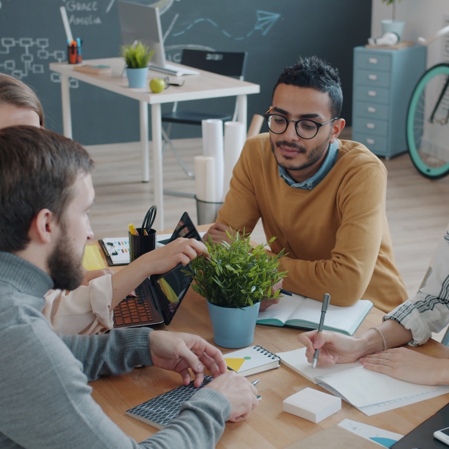 Team members reviewing work together at the office